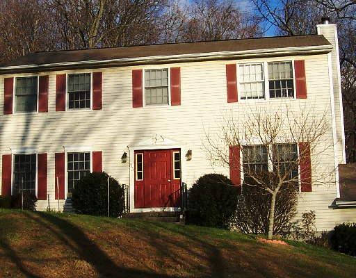 63 Ball Pond Road Danbury, CT 06811 - Photo 1 of 1 a front view of a house with barbeque area