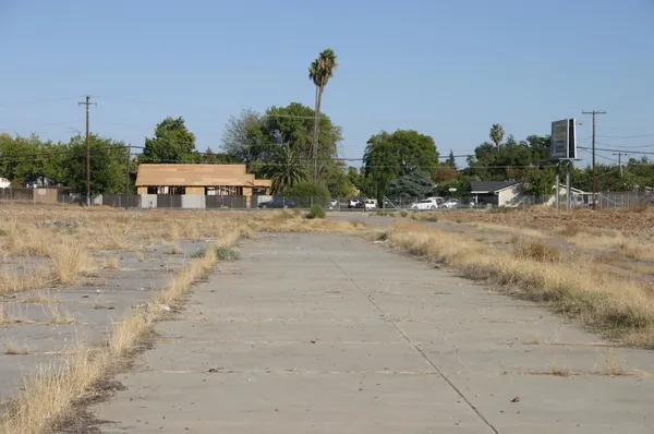 a view of a yard covered in snow
