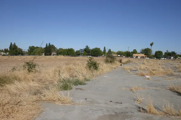 a view of ocean beach and residential houses