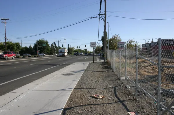 a view of a pathway both side of building