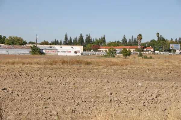 a view of residential houses with outdoor space