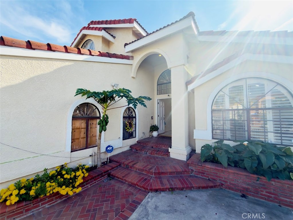 10452 Circulo De Juarez Fountain Valley, CA 92708 - Photo 1 of 34 a front view of a house