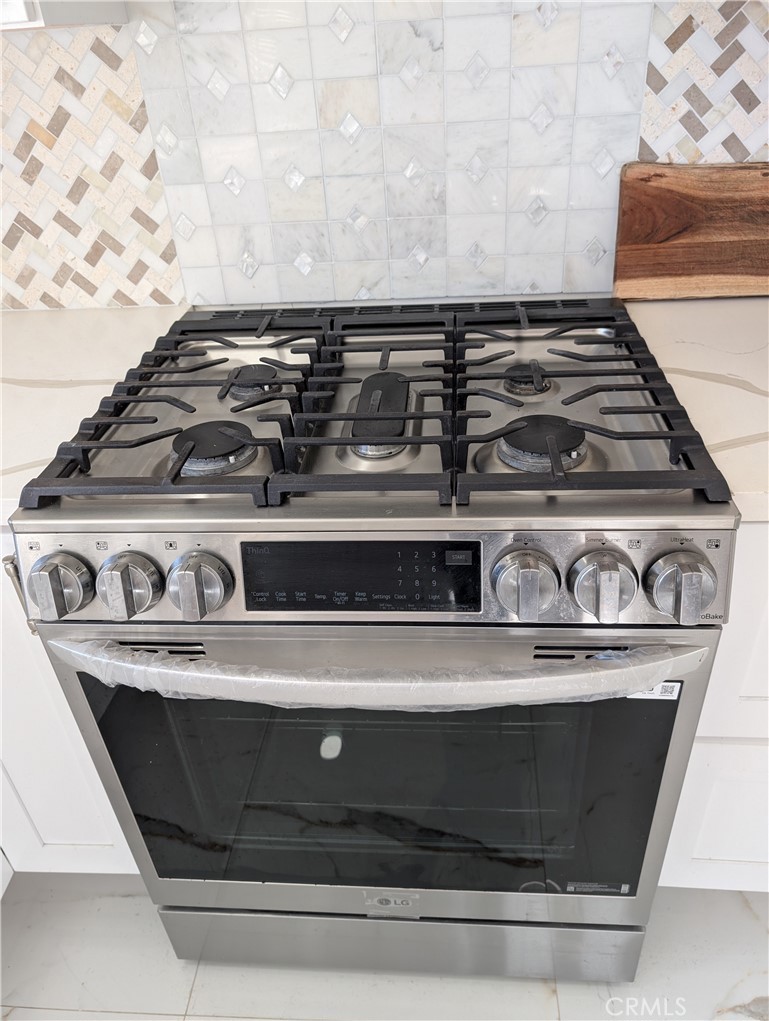 10452 Circulo De Juarez Fountain Valley, CA 92708 - Photo 14 of 34 a close view of stove top oven