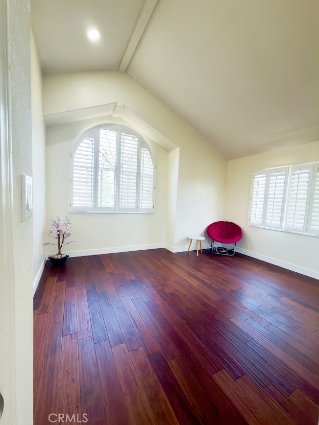10452 Circulo De Juarez Fountain Valley, CA 92708 - Photo 31 of 34 an empty room with wooden floor and windows