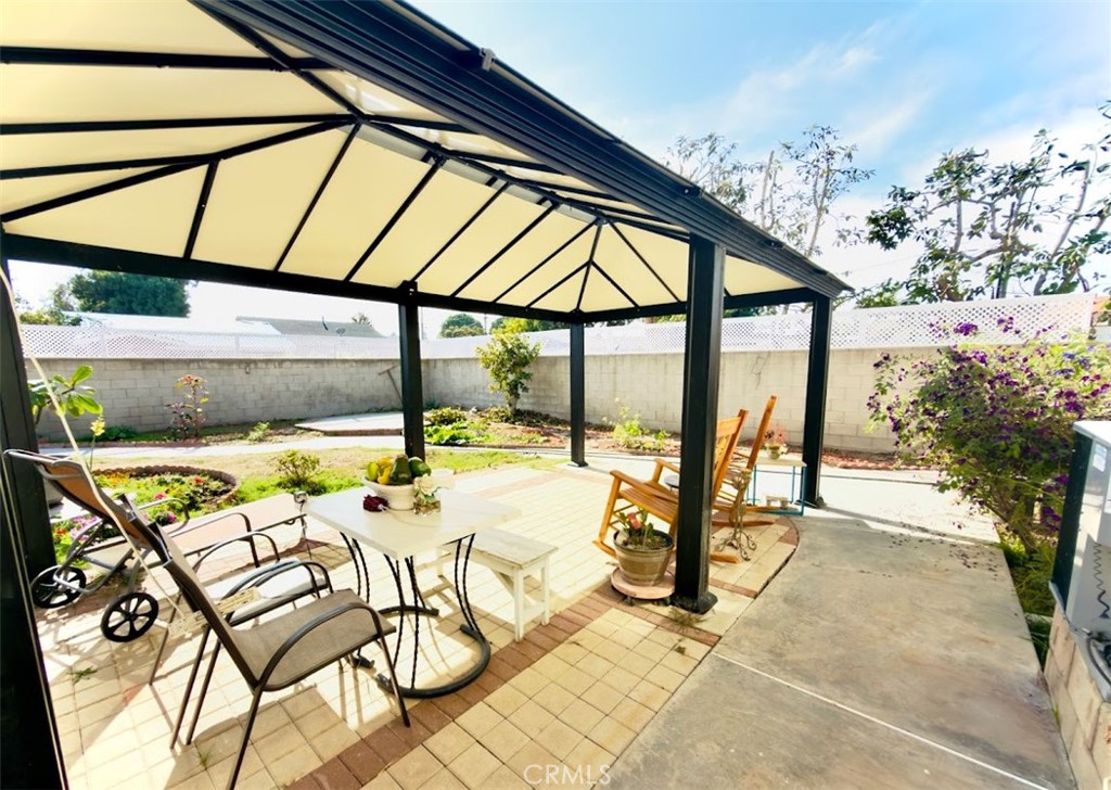 10452 Circulo De Juarez Fountain Valley, CA 92708 - Photo 32 of 34 a view of swimming pool with a lounge chairs