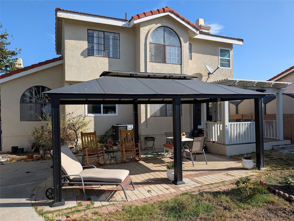 10452 Circulo De Juarez Fountain Valley, CA 92708 - Photo 34 of 34 a front view of a house with porch