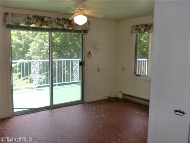 1309 Coventry Road High Point, NC 27262 - Photo 14 of 16 Sunroom.