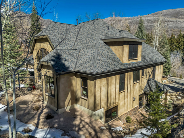9049 Timphaven Road Sundance, UT 84604 - Photo 2 of 63 View of side of home with roof with shingles