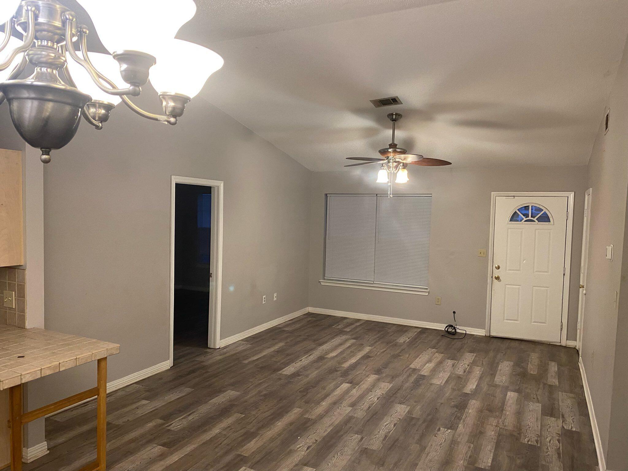 12 Flora Cove Crestview, FL 32539 - Photo 2 of 16 a view of a chandelier fan and wooden floor