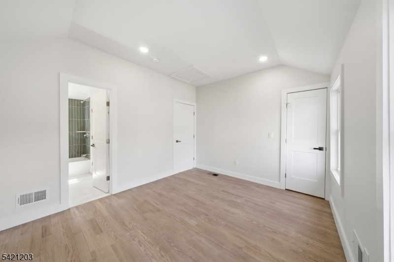 33 Clinton Place Morristown, NJ 07960 - Photo 12 of 24 wooden floor in an empty room with a window
