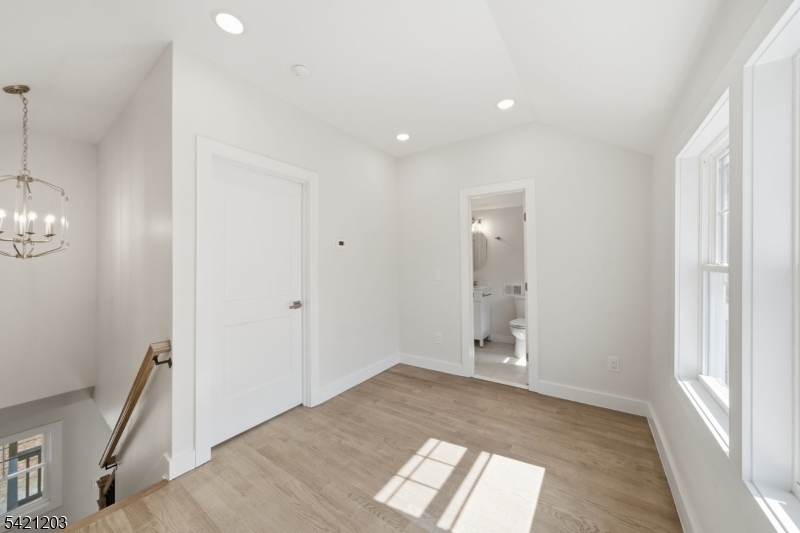 33 Clinton Place Morristown, NJ 07960 - Photo 8 of 24 wooden floor in an empty room with a window