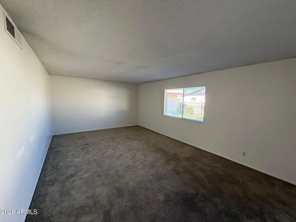 an empty room with a window