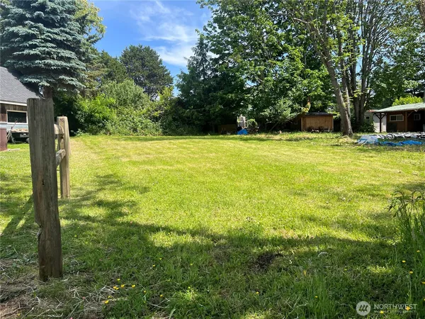 a view of a yard with an outdoor space