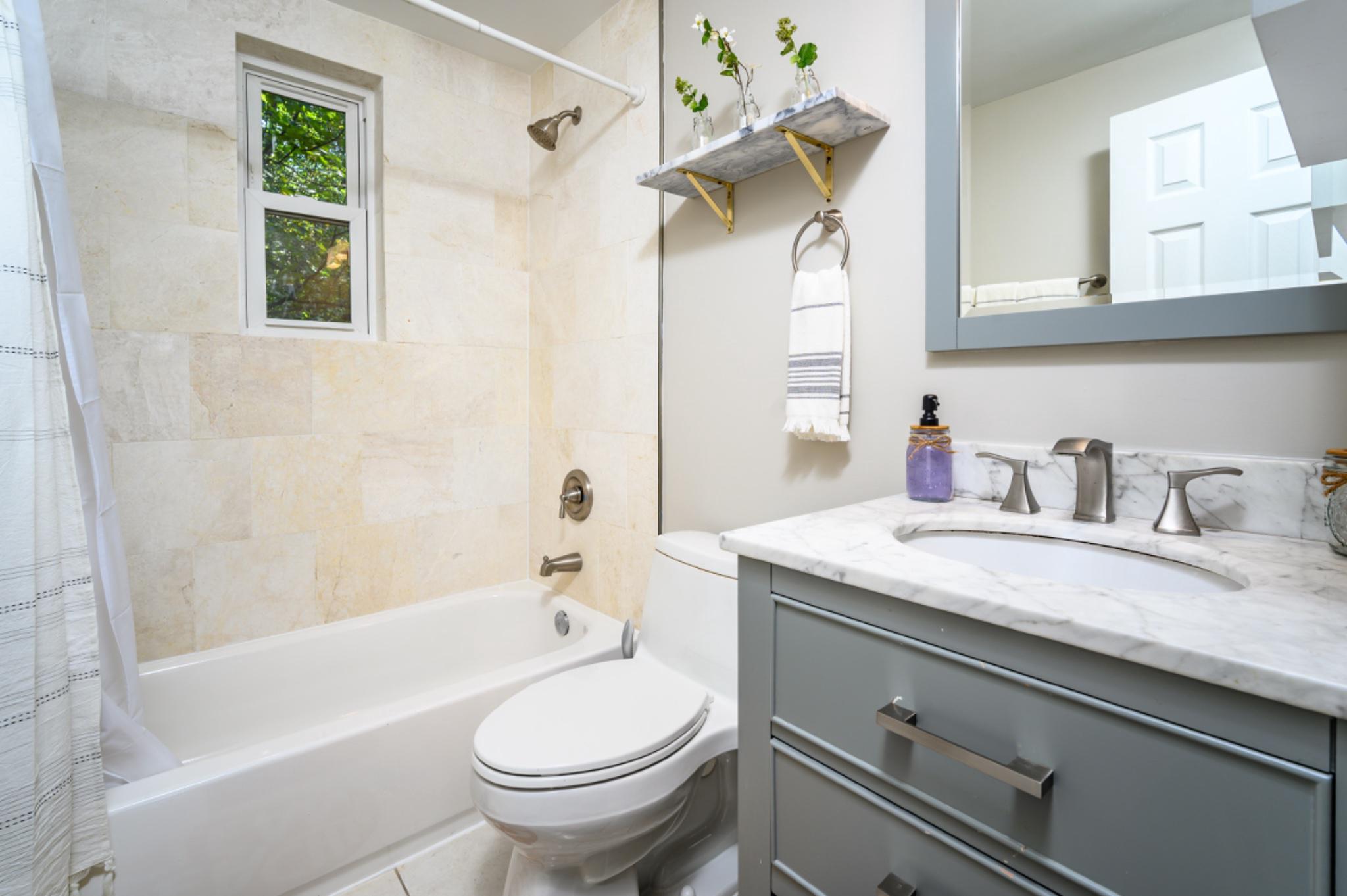 5053 Sheriff Road Northeast Washington, DC 20019 - Photo 17 of 32 Modern 1 bathroom with natural light.