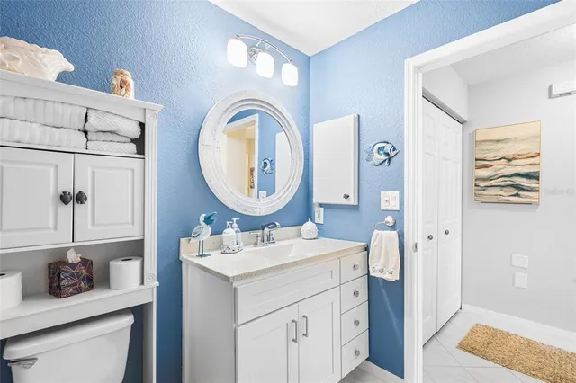 a view of bathroom with a washer and dryer