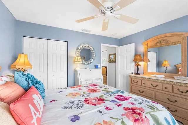 a view of a chairs and table in the balcony