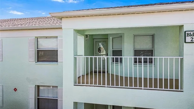 a view of hallway with livingroom