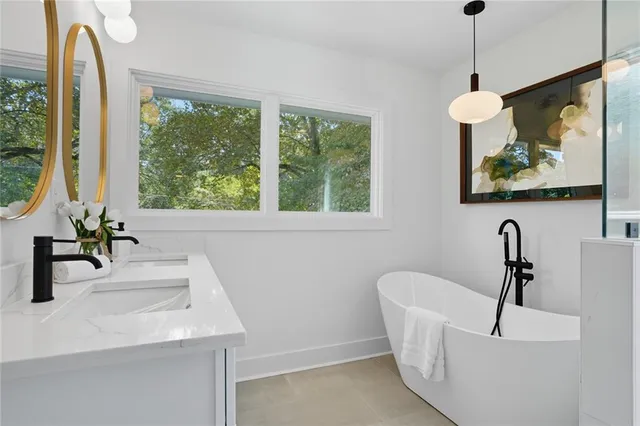 a bathroom with a sink and a bathtub