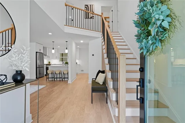 a view of a hallway with seating area