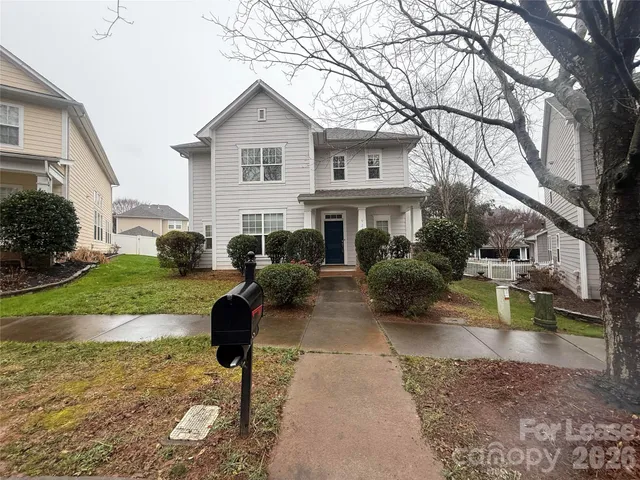 a bathroom with a sink vanity and mirror
