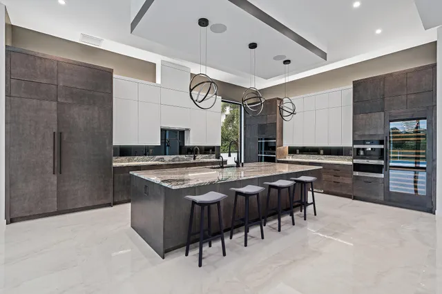 a view of an empty room with glass door