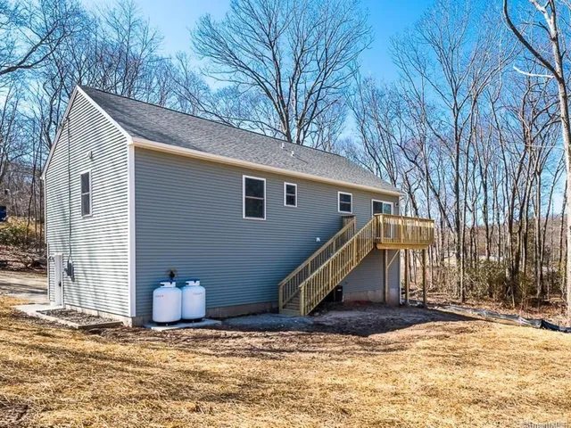 a view of a house with snow on the wall