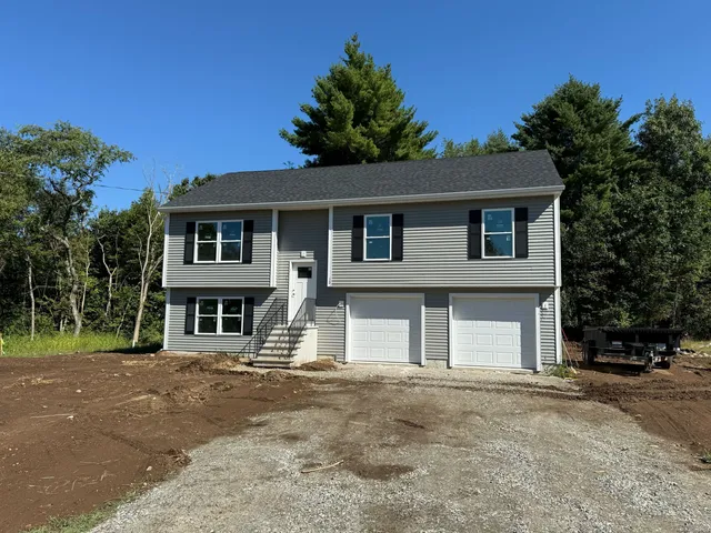 front view of a house with a street
