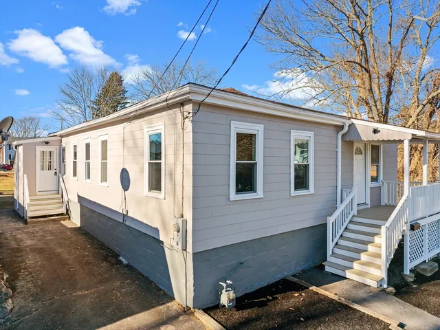 a view of a house with a roof deck
