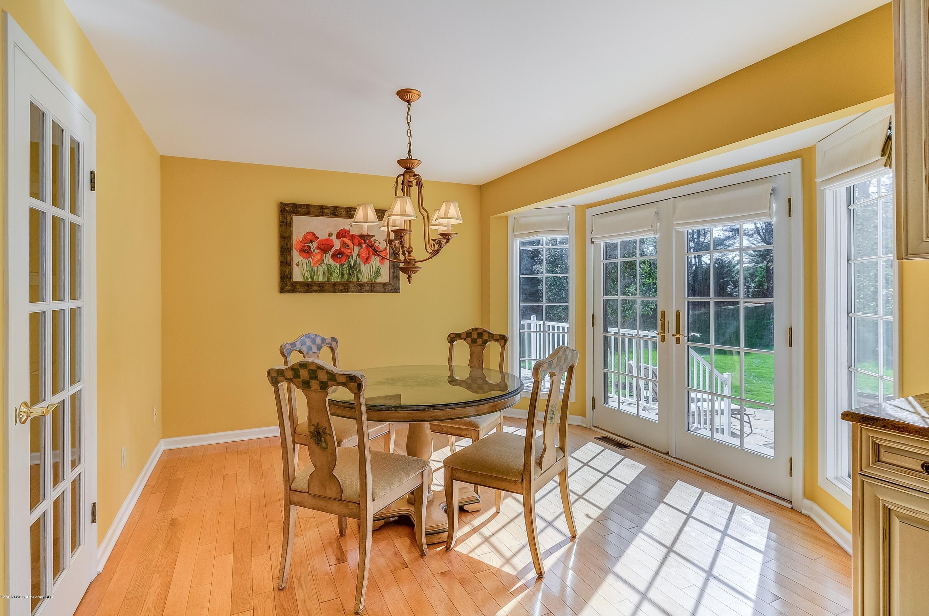 490 Burlington Road Freehold, NJ 07728 - Photo 14 of 34 a view of a dining room with furniture window and outside view