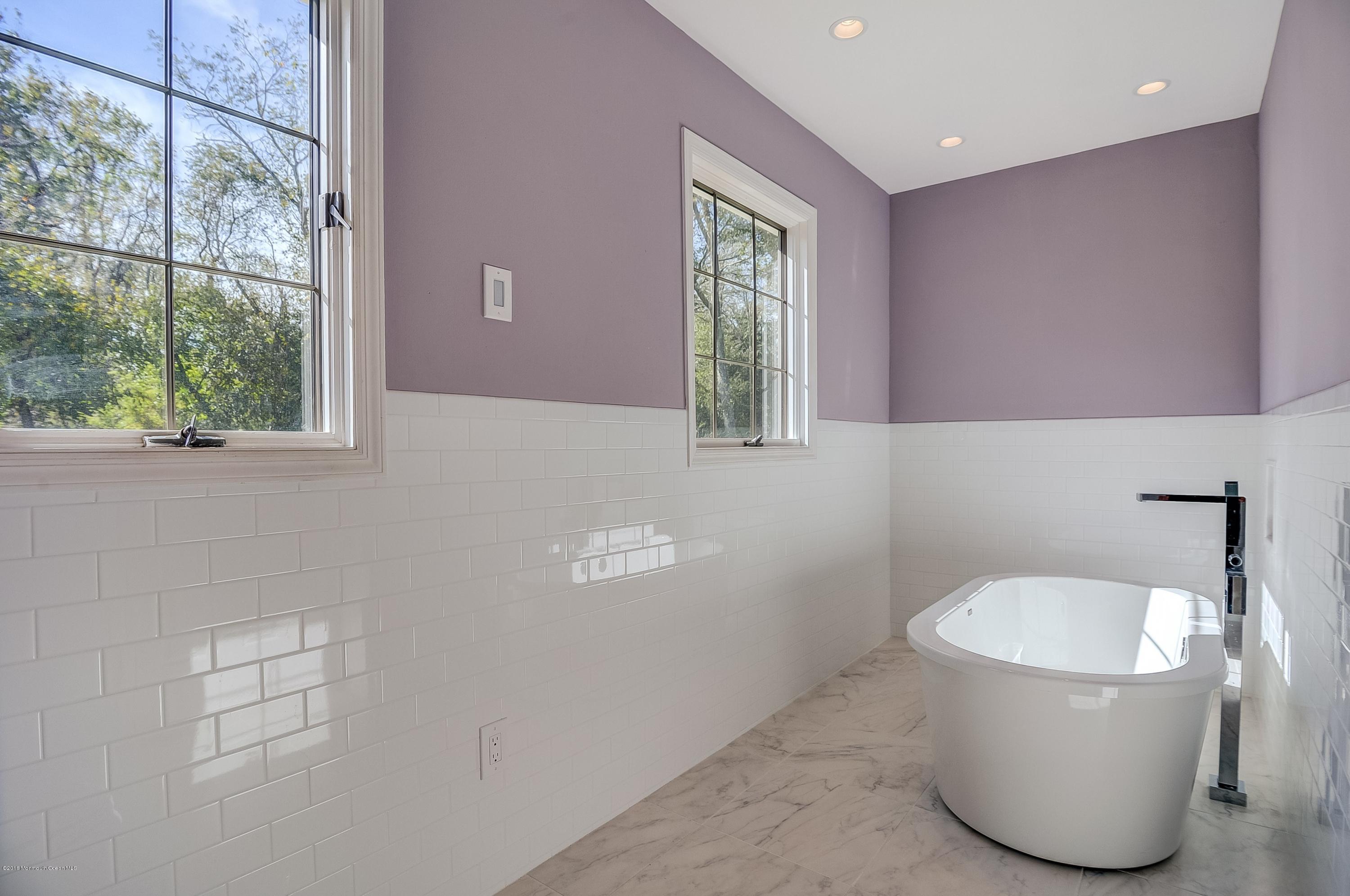 490 Burlington Road Freehold, NJ 07728 - Photo 24 of 34 a bathroom with a toilet a sink and window