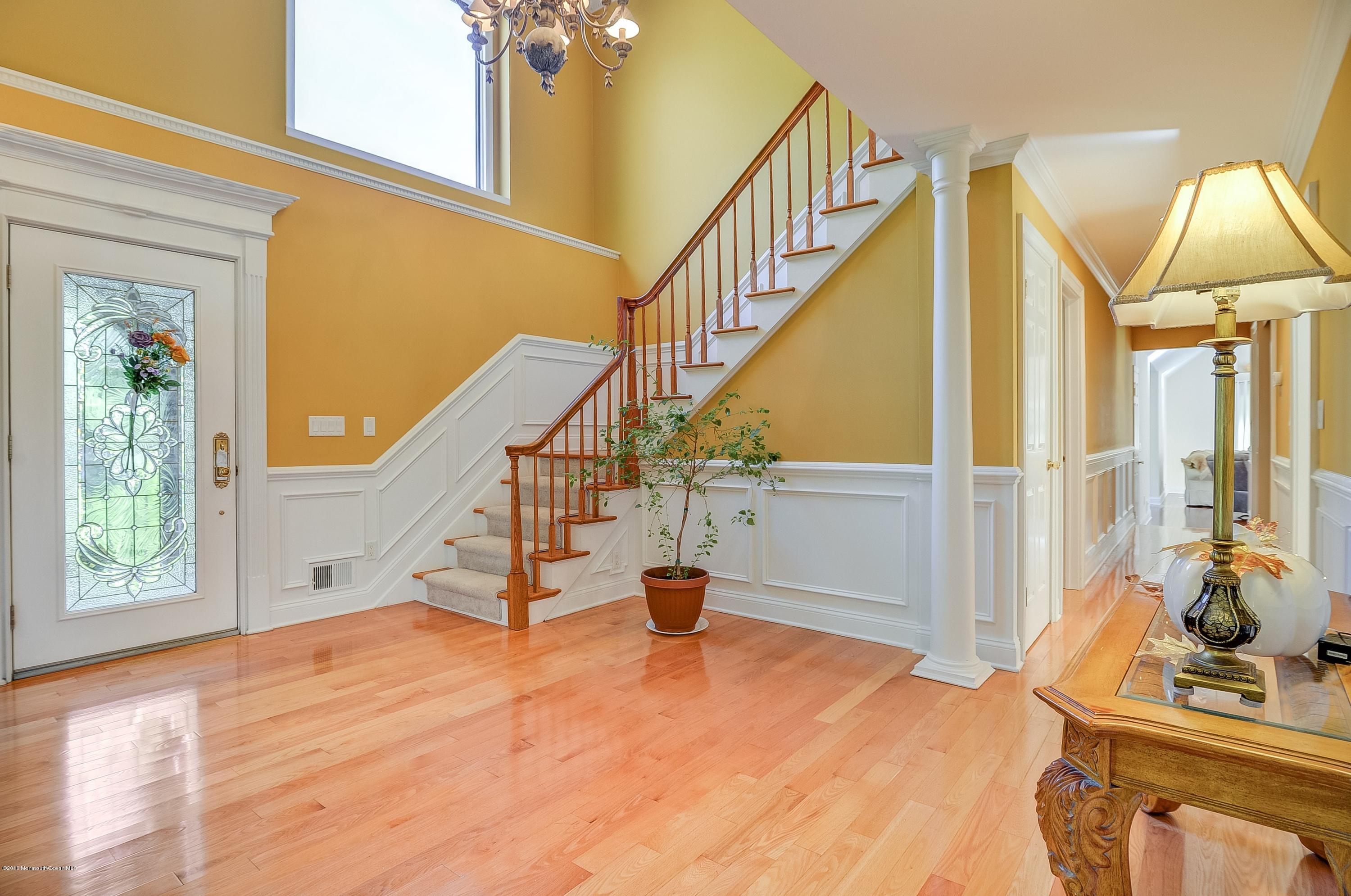 490 Burlington Road Freehold, NJ 07728 - Photo 6 of 34 a view of entryway and hall with wooden floor