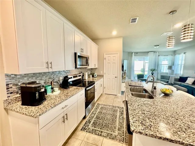 a bathroom with a tub and shower