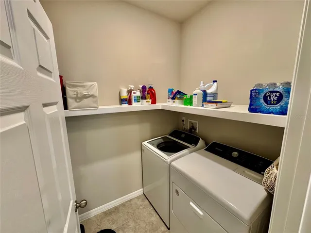 view of living room with furniture and painting on the wall