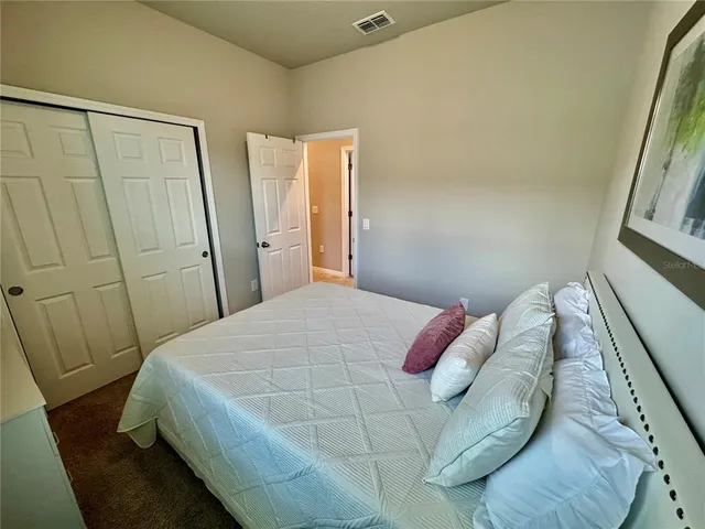 a kitchen with a stove microwave and refrigerator