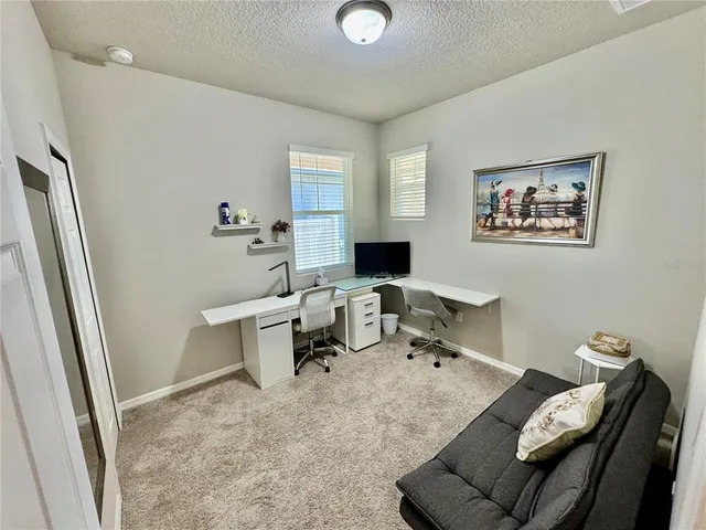 a view of livingroom with furniture and storage