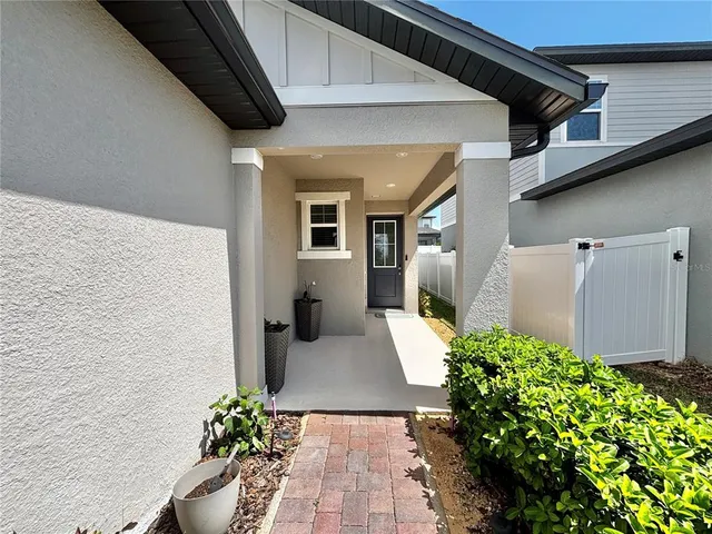 a view of a backyard with plants