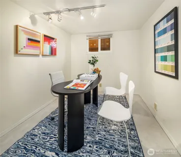 a living room with a couch and a table