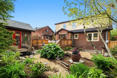 a view of a yard from a balcony