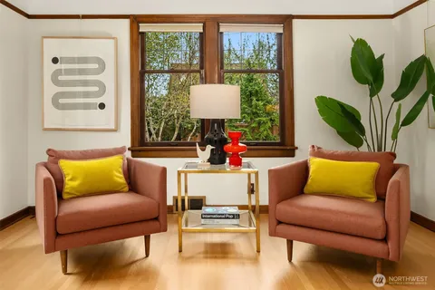 a living room with furniture and a window