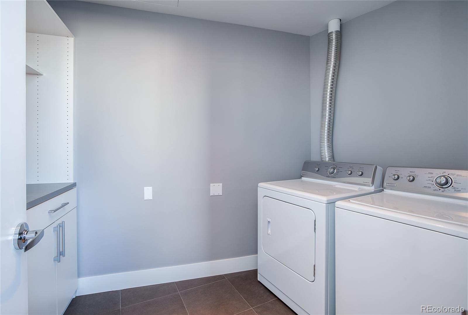 1200 Acoma Street, Unit 603 Denver, CO 80204 - Photo 17 of 30 a utility room with dryer and washer