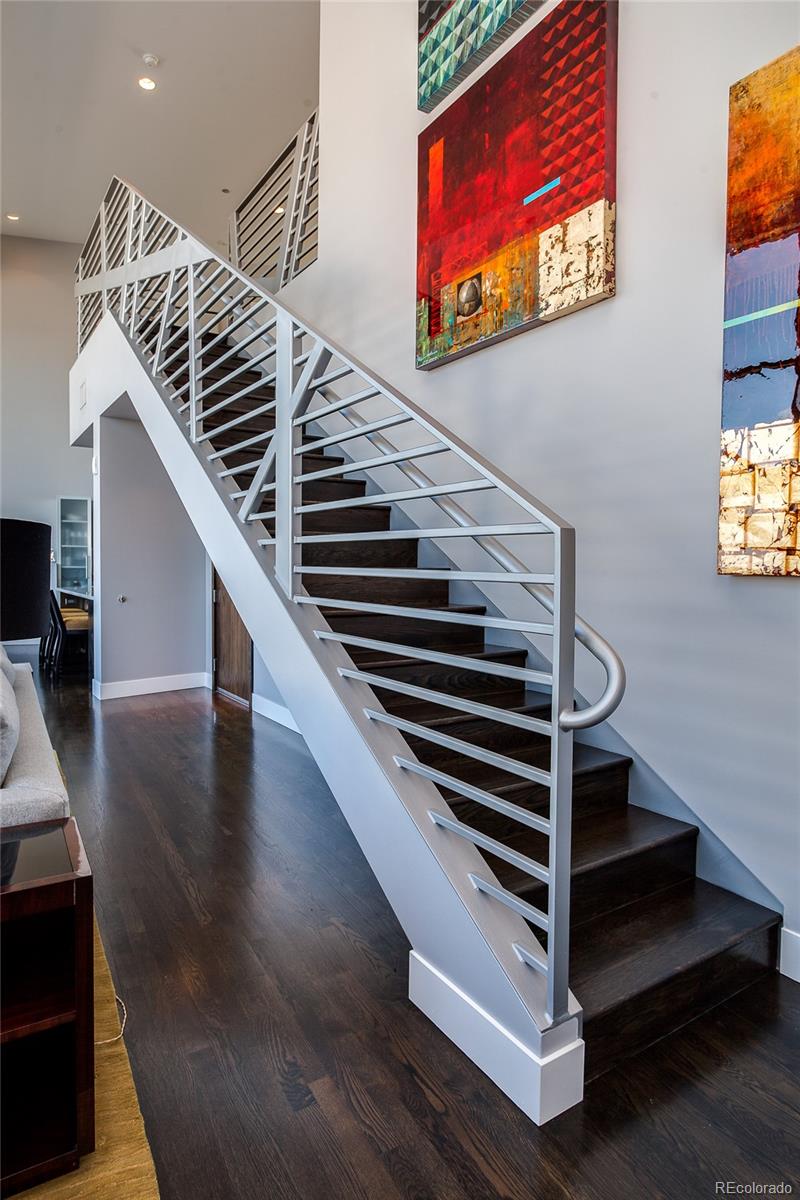 1200 Acoma Street, Unit 603 Denver, CO 80204 - Photo 18 of 30 a view of entryway and hall with wooden floor