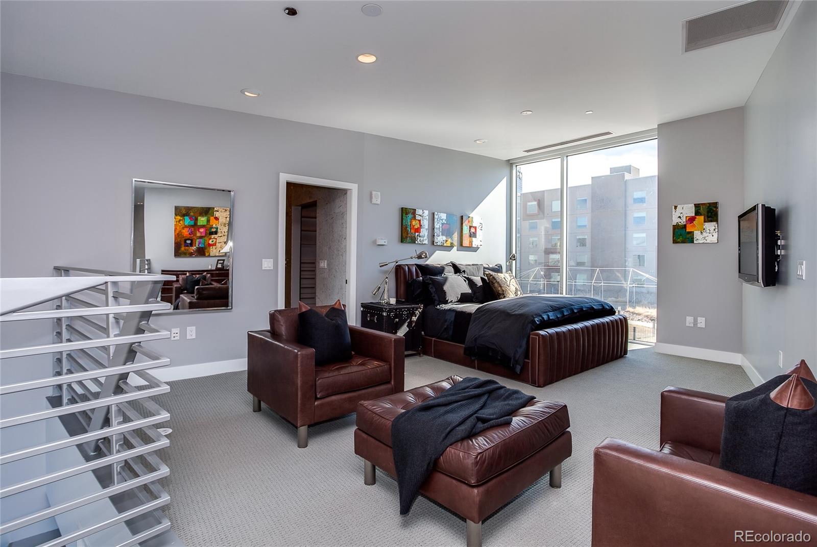 1200 Acoma Street, Unit 603 Denver, CO 80204 - Photo 21 of 30 a living room with furniture and a window