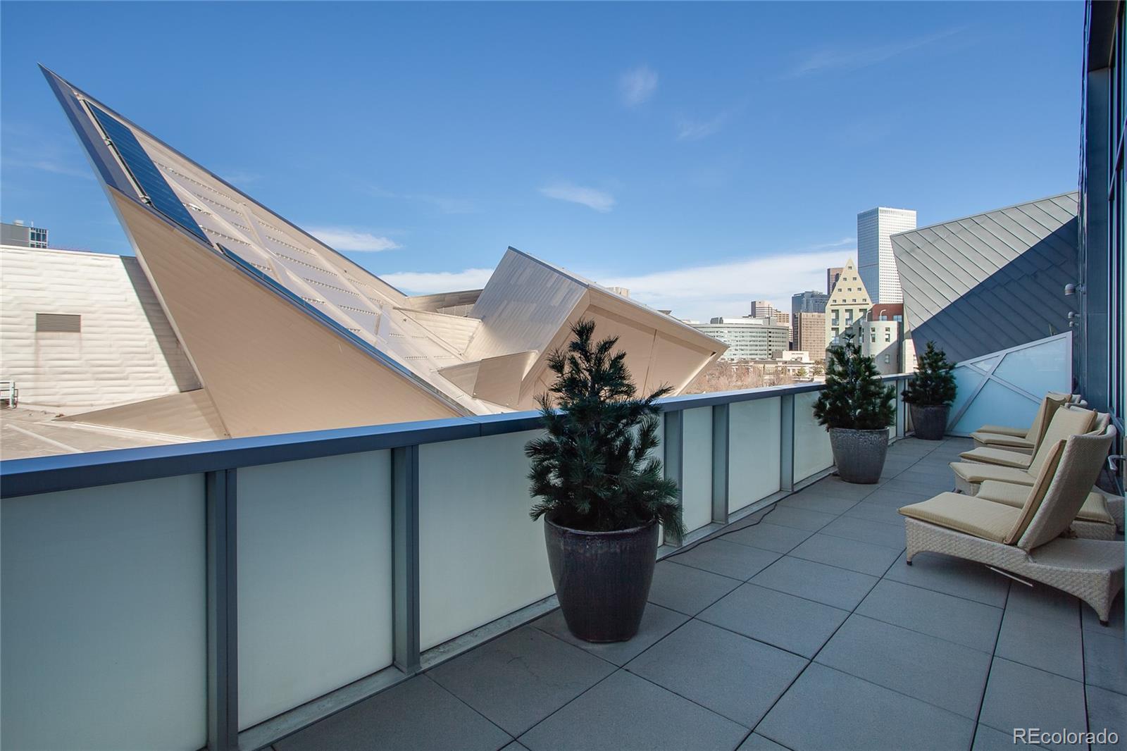 1200 Acoma Street, Unit 603 Denver, CO 80204 - Photo 28 of 30 a view of a terrace with chairs