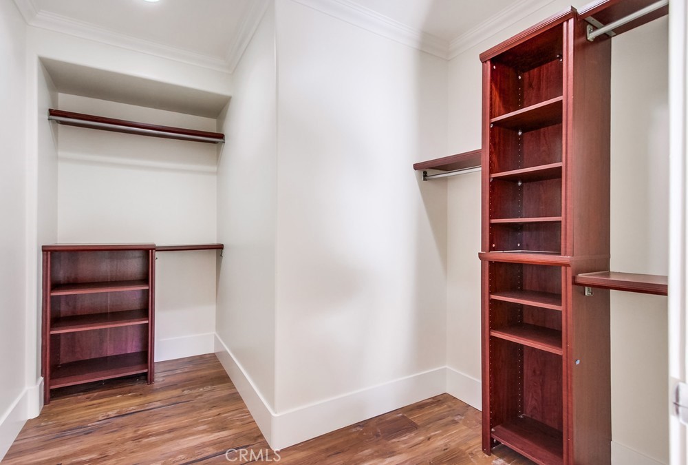 3927 Valle Del Sol Bonsall, CA 92003 - Photo 19 of 41 a view of walk in closet with empty racks