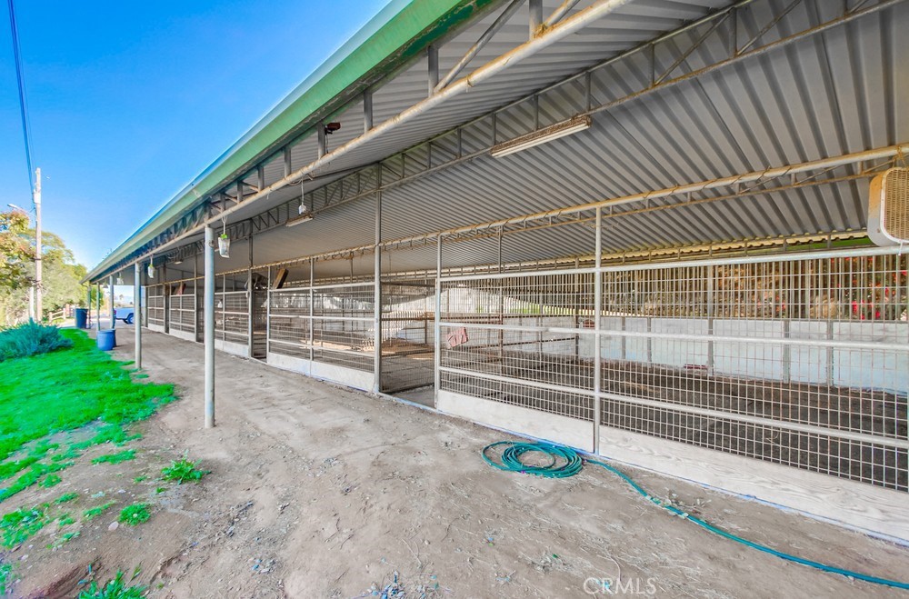 3927 Valle Del Sol Bonsall, CA 92003 - Photo 27 of 41 a view of a backyard with a wooden fence