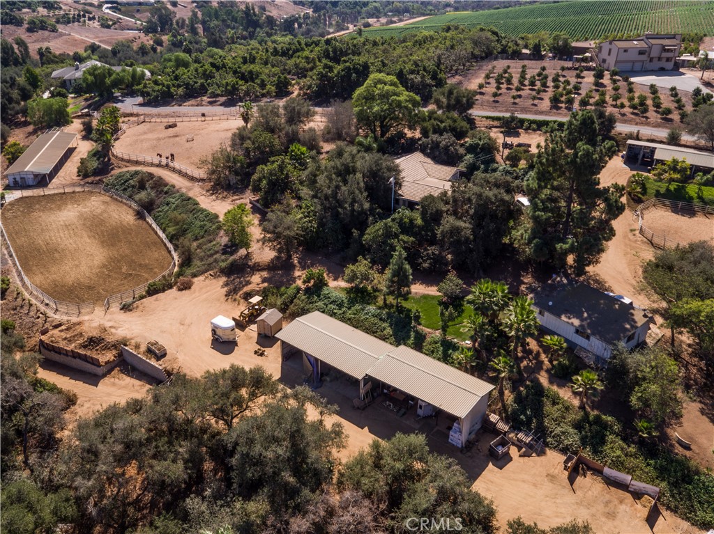 3927 Valle Del Sol Bonsall, CA 92003 - Photo 40 of 41 an aerial view of a house with a yard and lake view