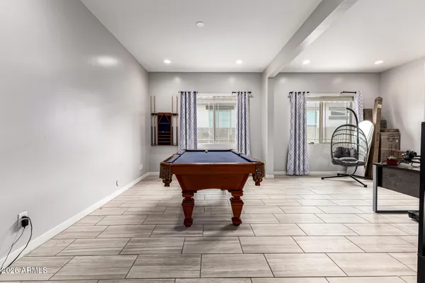 a bedroom with a workspace