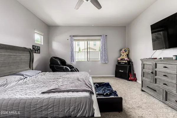 a bedroom with a bed and a closet