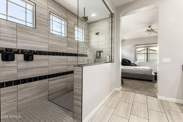 a kitchen with stainless steel appliances a sink and cabinets