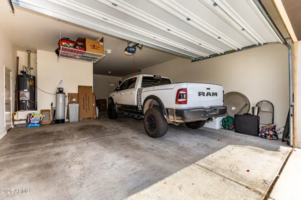 a view of storage and utility room with washer and dryer
